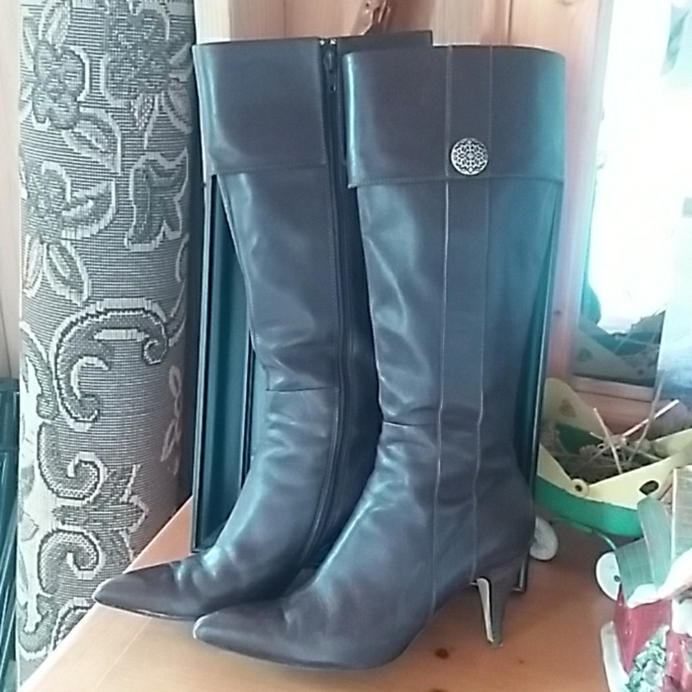 Tahari knee high boots.